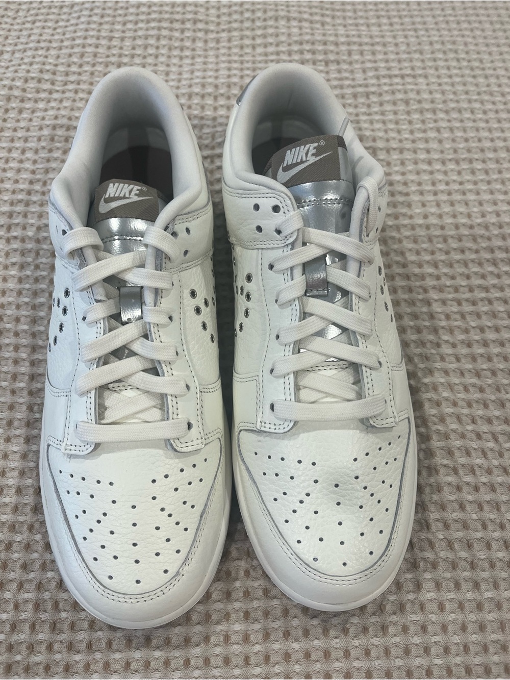 Nike Women’s White Sneakers with Silver Tongue